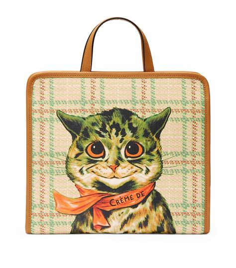 gucci cat top handle bag.